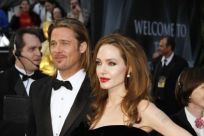 Brad Pitt and Angelina Jolie arrive at the 84th Academy Awards.