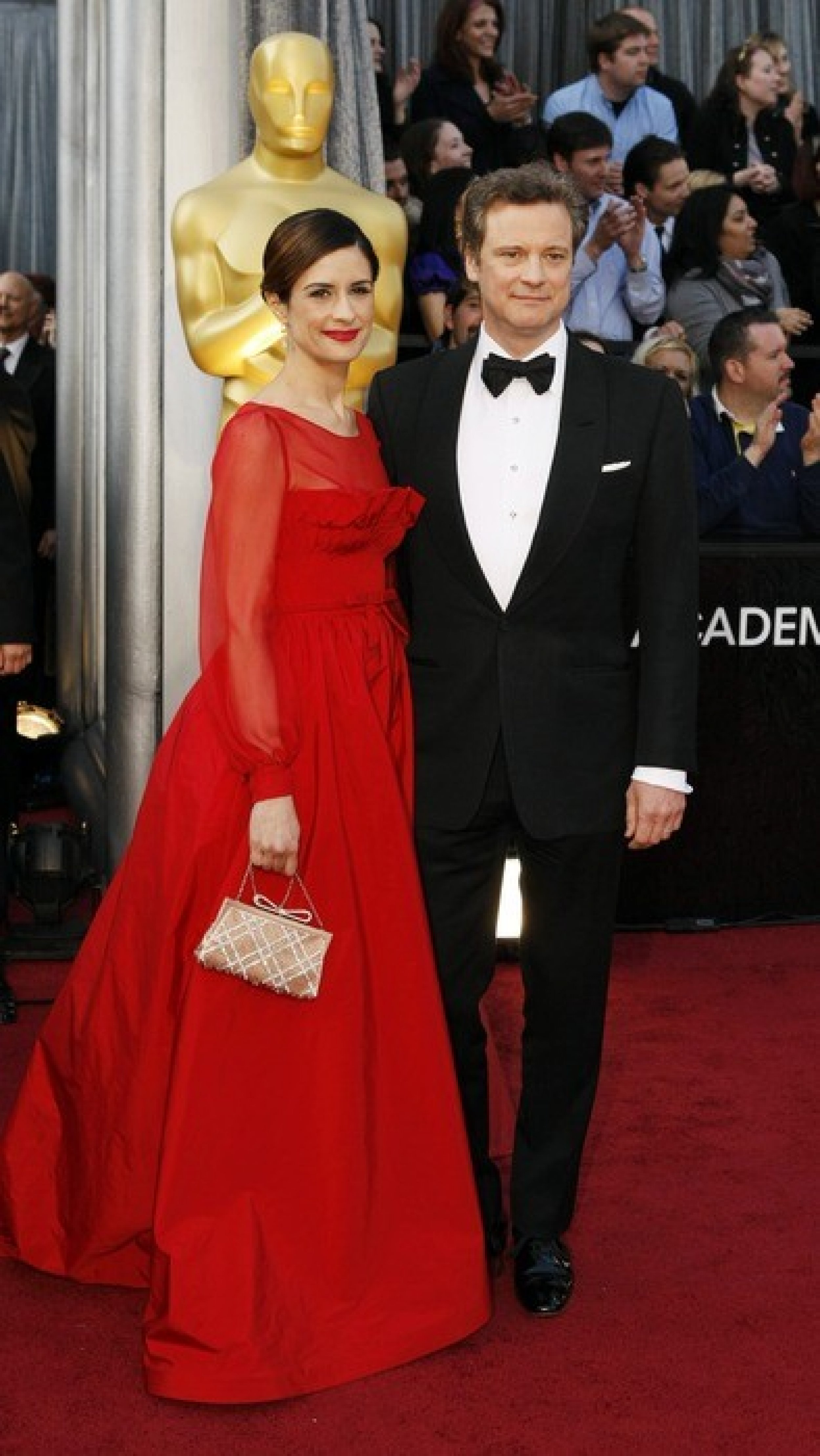 Colin Firth and Livia Giuggioli arrive at the 84th Academy Awards.