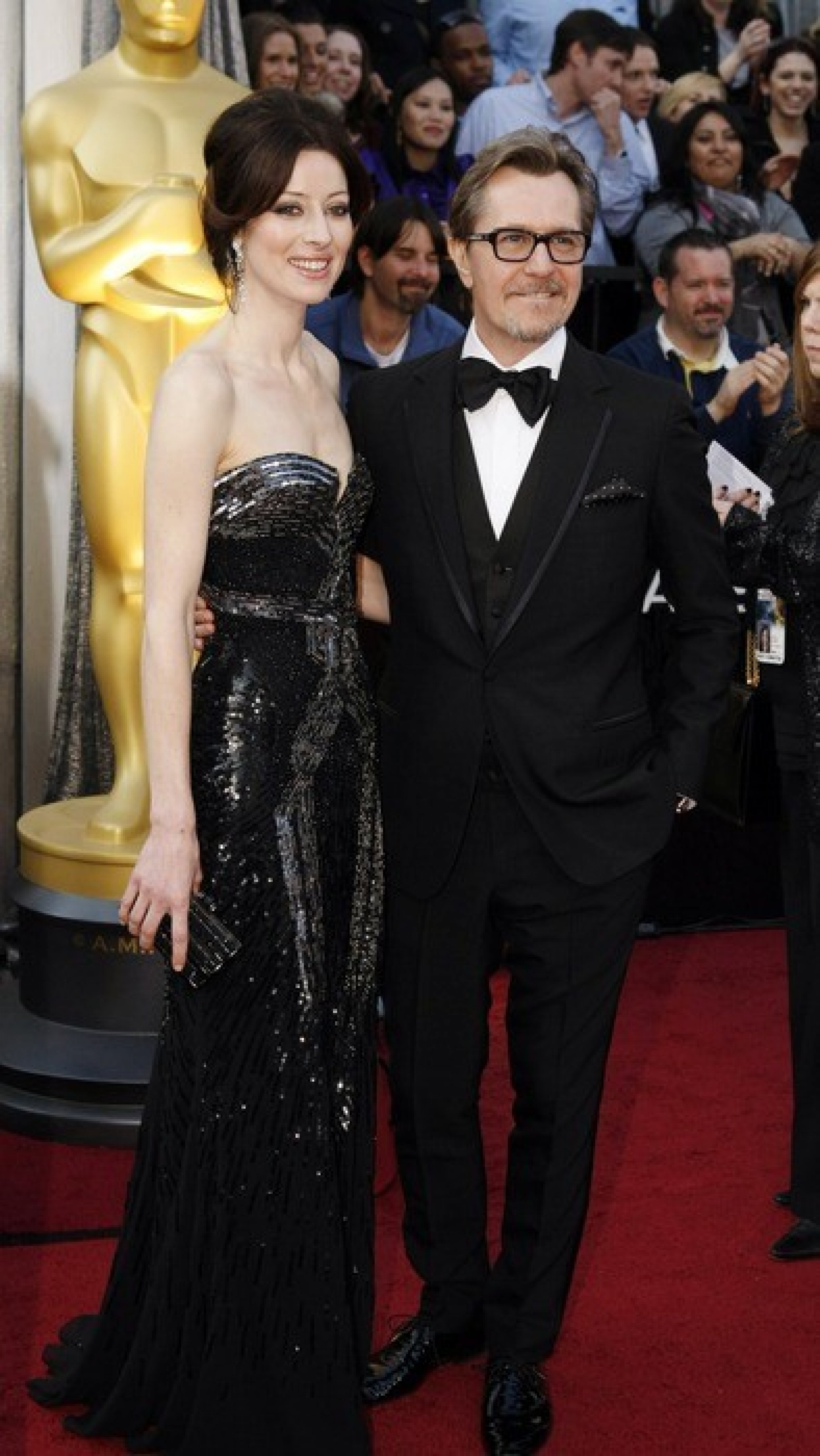 Nominee Gary Oldman and Alexandra Edenborough arrive at the 84th Academy Awards.