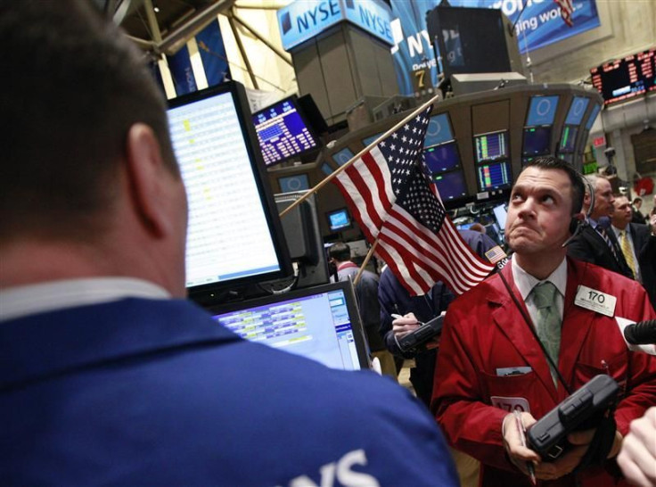 Traders work on the floor of the New York Stock Exchange