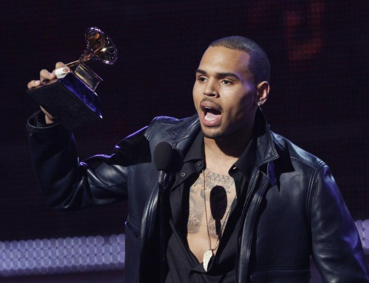 Although buzz from last night's Oscar ceremony is still clouding viewer's minds, another award show sparked some hype this weekend. At this past Saturday's Independent Spirit Awards, comedian Seth Rogen took a jab at R&B singer Chris Brown.