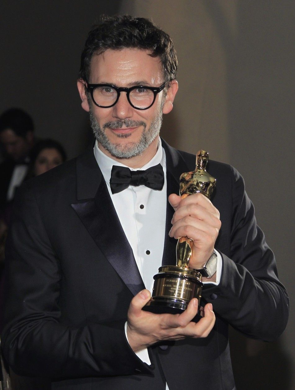 French Director, Hazanavicius, winner of best director for his film quotThe Artistquot smiles with his Oscar statuette during the Governors Ball following the 84th Academy Awards in Hollywood