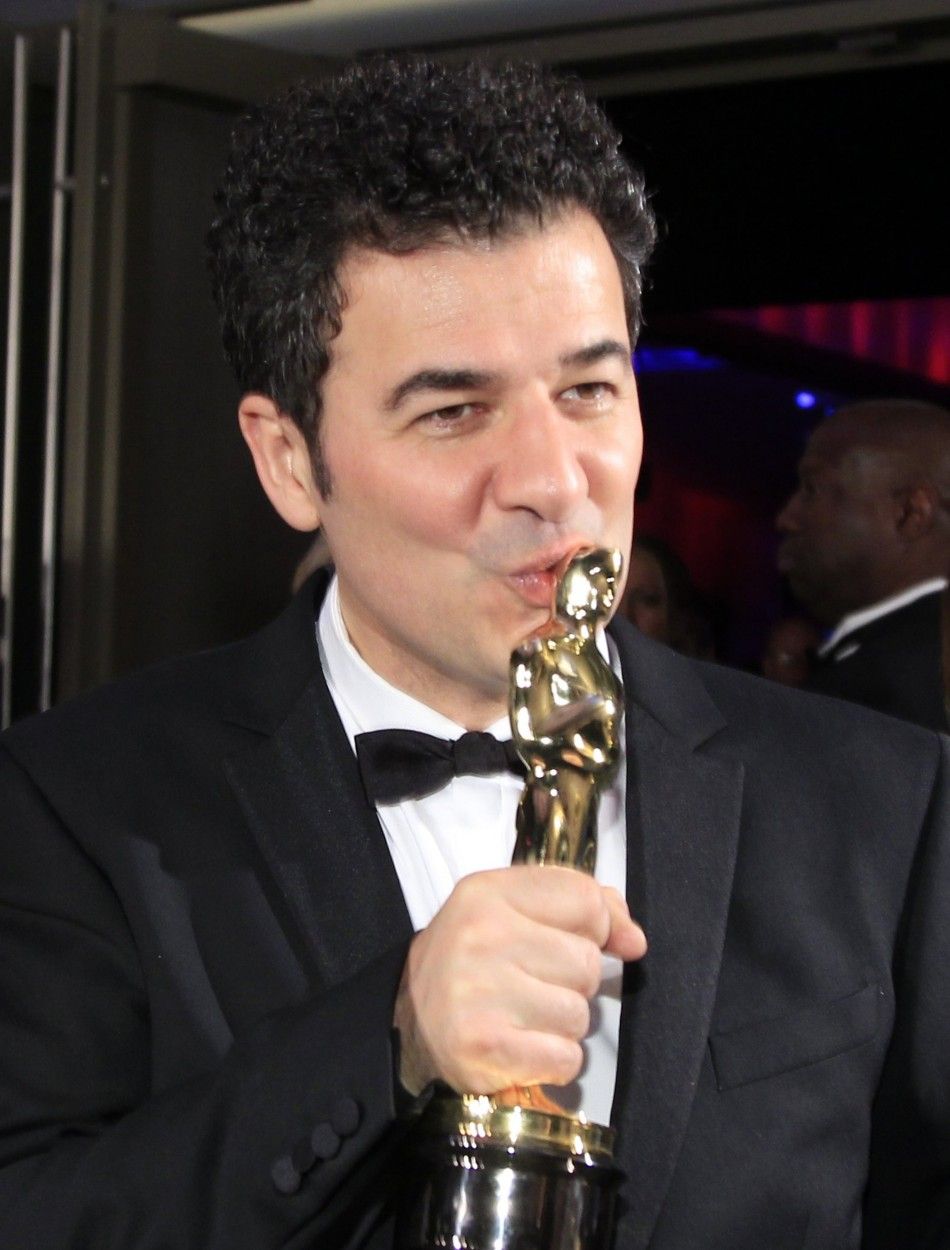 Bource, winner of Music Original Score award for the film quotThe Artistquot poses at the Governors Ball at the 84th Academy Awards in Hollywood