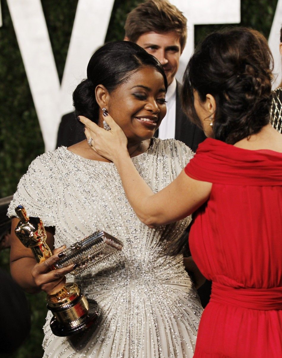 Spencer, Best Supporting Actress winner for her role in quotThe Helpquot, is greeted by actress Hayek as they arrive at the 2012 Vanity Fair Oscar party in West Hollywood