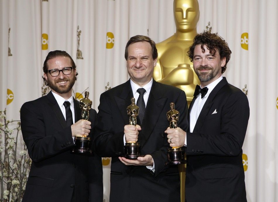 Alex Henning, Rob Legato and Ben Grossmann, winners of the Visual Effects award for the film quotHugoquot, pose with their Oscars during the 84th Academy Awards in Hollywood