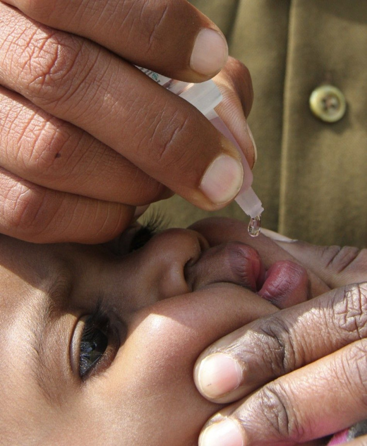 A child receives polio drops during the polio eradication programme in the northern Indian city of Chandigarh.