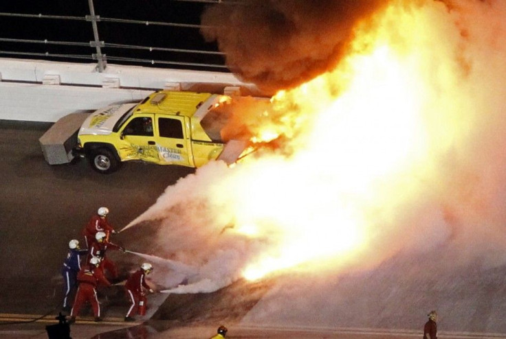 A jet dryer truck burns on the track at the Daytona 500 after Juan Pablo Montoya smashed into it.