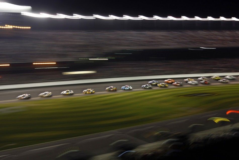 The field comes down the front stretch during the rain delayed NASCAR Sprint Cup Series Daytona 500 at the Daytona International Speedway in Daytona Beach