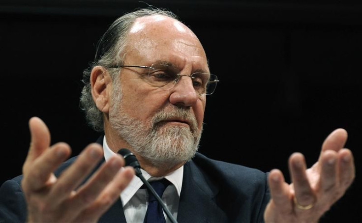Corzine gestures as he testifies before a House Financial Services Committee Oversight and Investigations Subcommittee hearing on the collapse of MF Global, at the U.S. Capitol in Washington