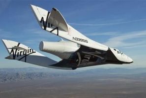 The Virgin Galactic SpaceShip2 (VSS Enterprise) glides toward Earth on its first test flight after being released from its WhiteKnight2 (VMS Eve) mothership over Mojave, California October 10, 2010. The craft was piloted by engineer and test pilot Pete Si