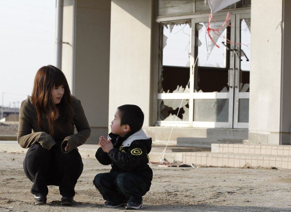 Woman from Iconic Tsunami Photo Reunited With Family Stares at Future