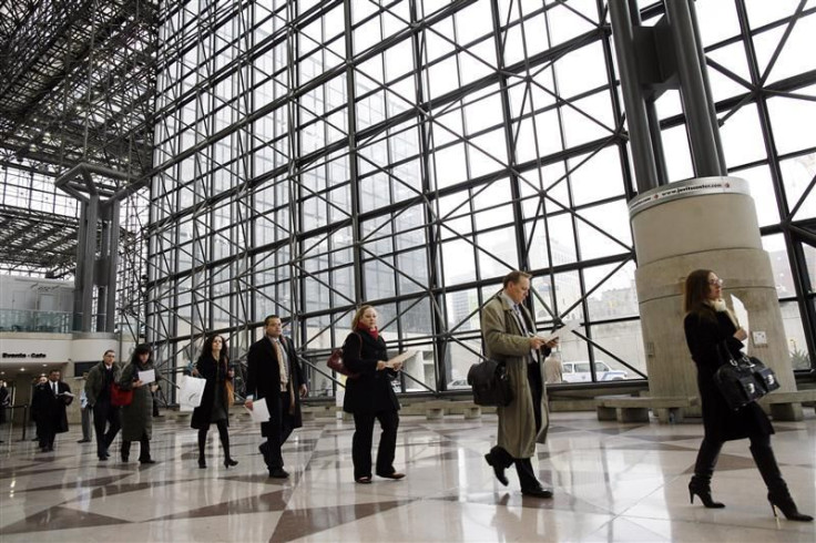 People walk in line to register for the 2009 CUNY Big Apple Job Fair at the Jacob K. Javits Convention Center in New York