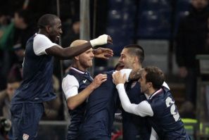 Members of the US soccer team celebrate Clint Dempsey&#039;s goal against Italy on Wednesday.