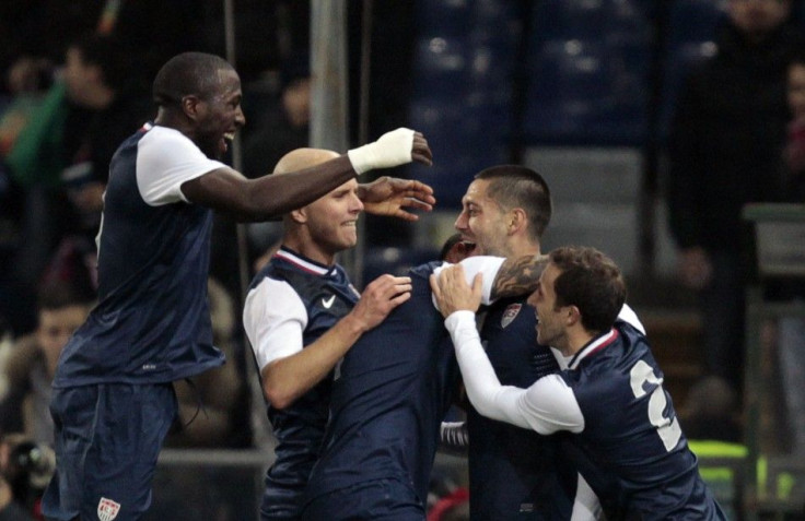 Members of the US soccer team celebrate Clint Dempsey&#039;s goal against Italy on Wednesday.