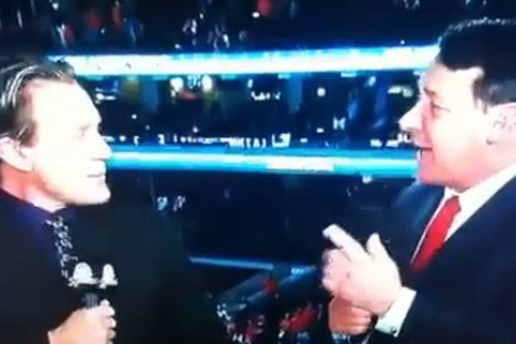 Jeremy Roenick and Mike Milbury battle on air during the Olympics.