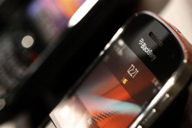 A BlackBerry smartphone handset is displayed in a store in Bern