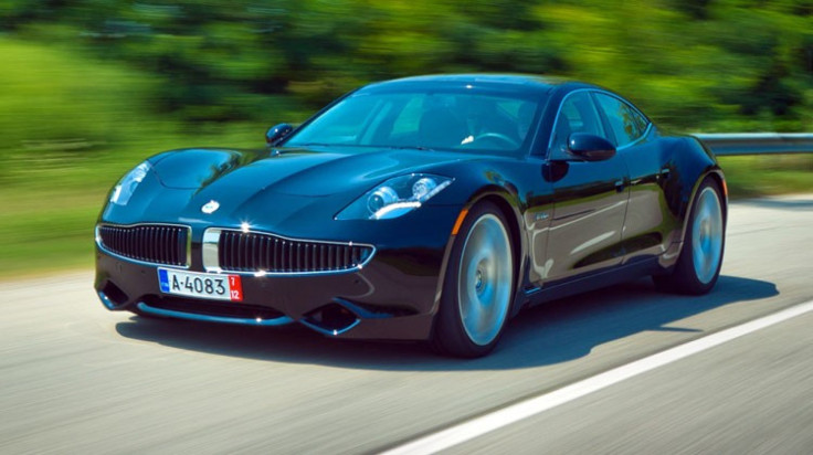 A Fisker Karma drives.