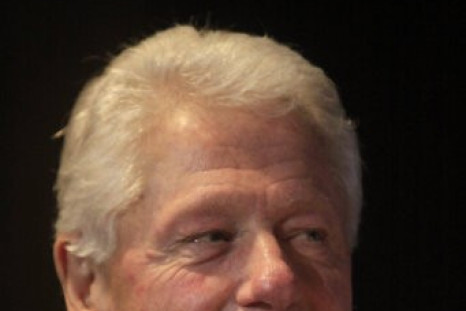 Former U.S. President Bill Clinton attends the annual ThisDay awards ceremony in Lagos, Nigeria, Monday, Feb. 13, 2012.