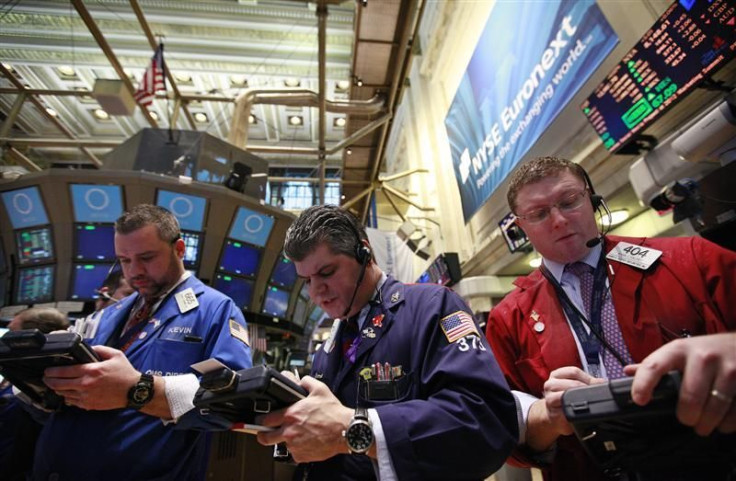 Traders work on the floor of the New York Stock Exchange