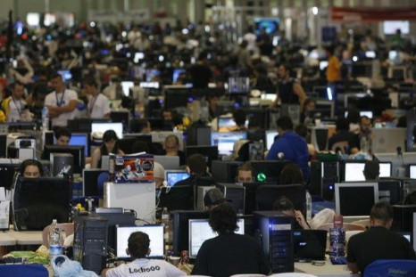 People surf the web during the annual &quot;Campus Party&quot; Internet users gathering in Valencia