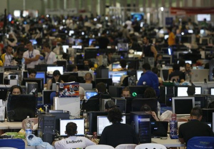 People surf the web during the annual &quot;Campus Party&quot; Internet users gathering in Valencia