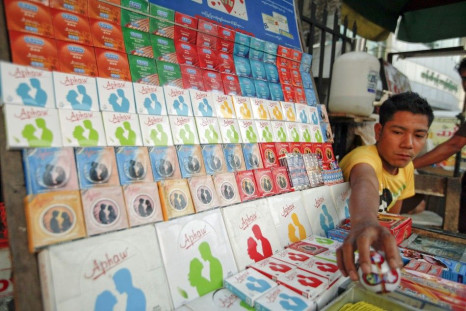 A man sells condoms in Yangon in Myanmar on Feb. 18, 2012.