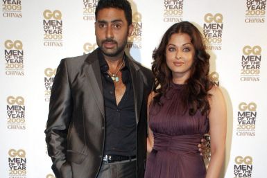 Abhishek Bachchan (L) and his wife Aishwarya Rai Bachchan
