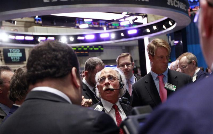 Traders work on the floor of the New York Stock Exchange