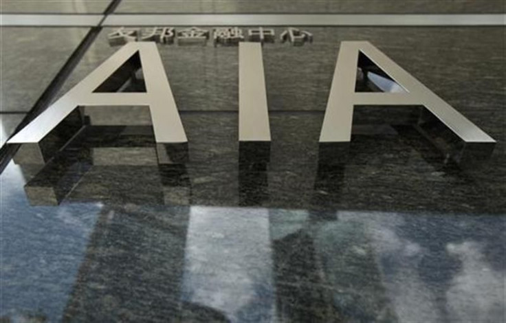 The logo of the AIA tower is seen at its entrance in Hong Kong