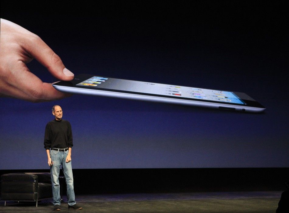 Apple Inc. CEO Steve Jobs introduces the iPad 2 on stage during an Apple event in San Francisc