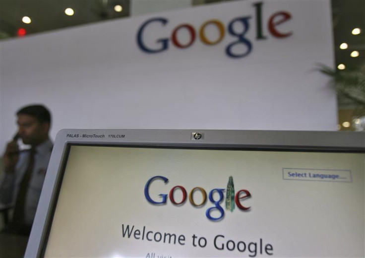 A security personnel answers a call at the reception counter of the Google office in the southern Indian city of Hyderabad