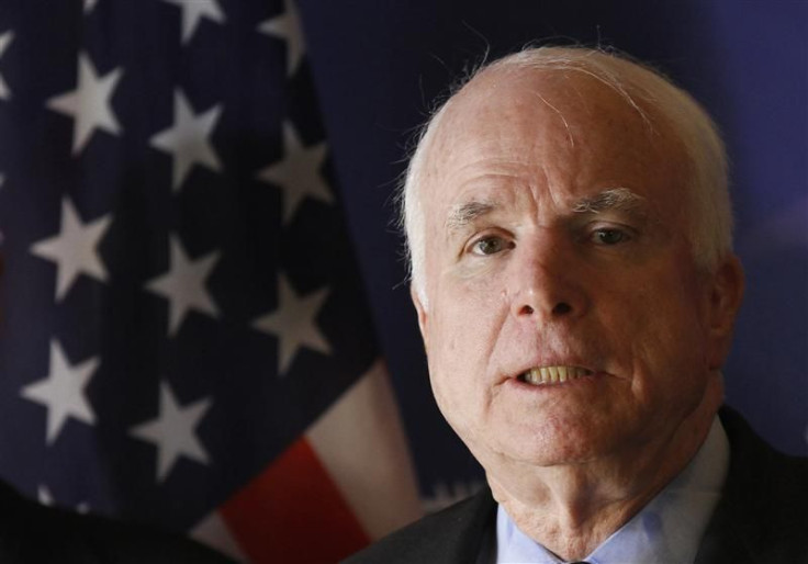 U.S. Senator John McCain speaks during a news conference in Tripoli