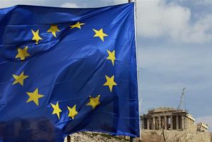 A European Union flag is seen in front of the Parthenon temple in Athens