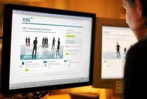 A web-user views the global networking site called Xing in Stockholm, November 20, 2008
