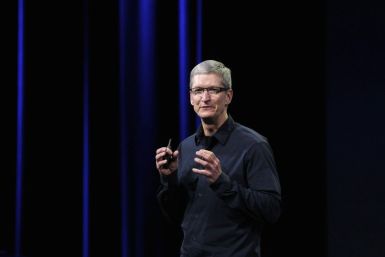 Apple CEO Cook speaks on stage during an Apple event introducing the new iPad in San Francisco
