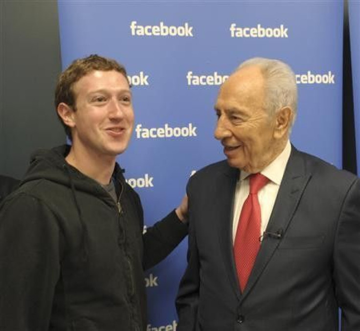 Israeli President Shimon Peres (R) poses with Facebook CEO Mark Zuckerberg at the company&#039;s headquarters in Menlo Park, California, in this handout photo released to Reuters by the Office of the President March 6, 2012.