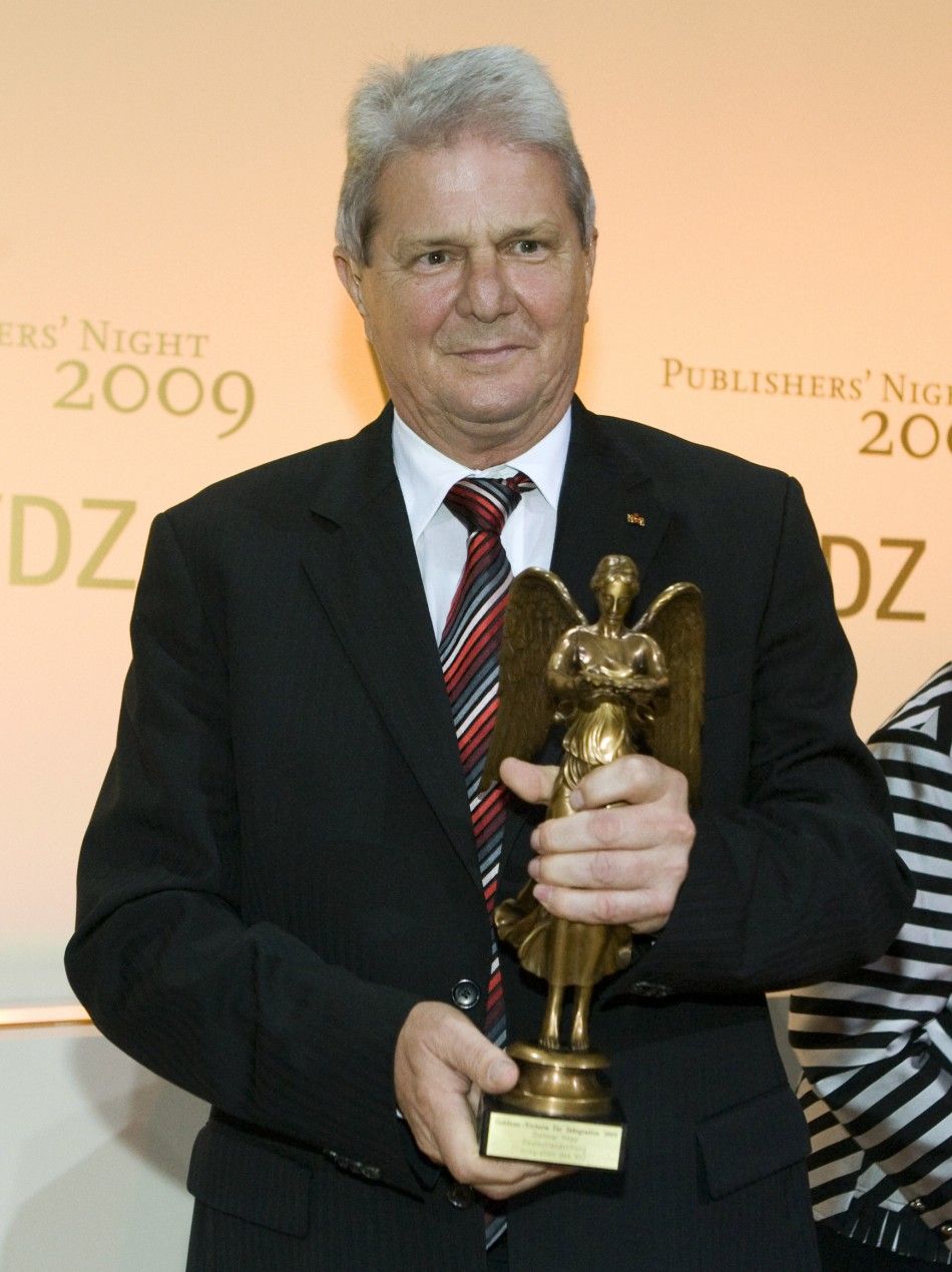 German Businessman Hopp holds the Golden Victoria in the category Prize for Integration at the VDZ Publishers Night in Berlin