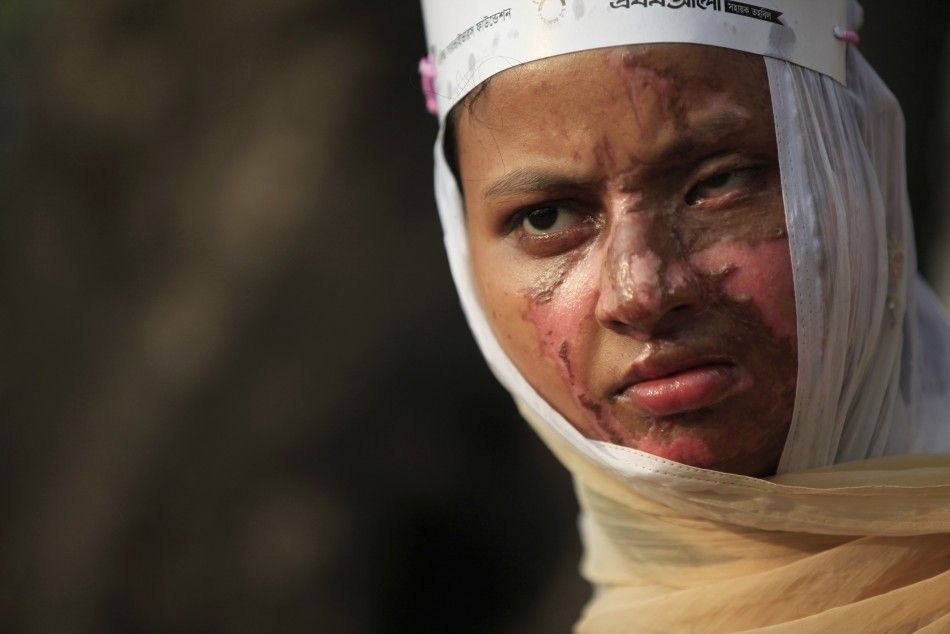  Sultana, a survivor of an acid attack, takes part in an awareness rally about the violence against women as they commemorate International Womens Day in Dhaka