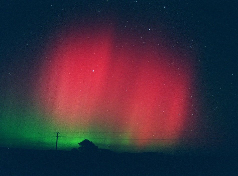 Aurora Australis, or the quotSouthern Lightsquot, glow in the sky over the town of Glenn Ourua near Palmeston North, north of New Zealands national capital Wellington on April 1, 2001, in the areas most dramatic display since 1989. 
