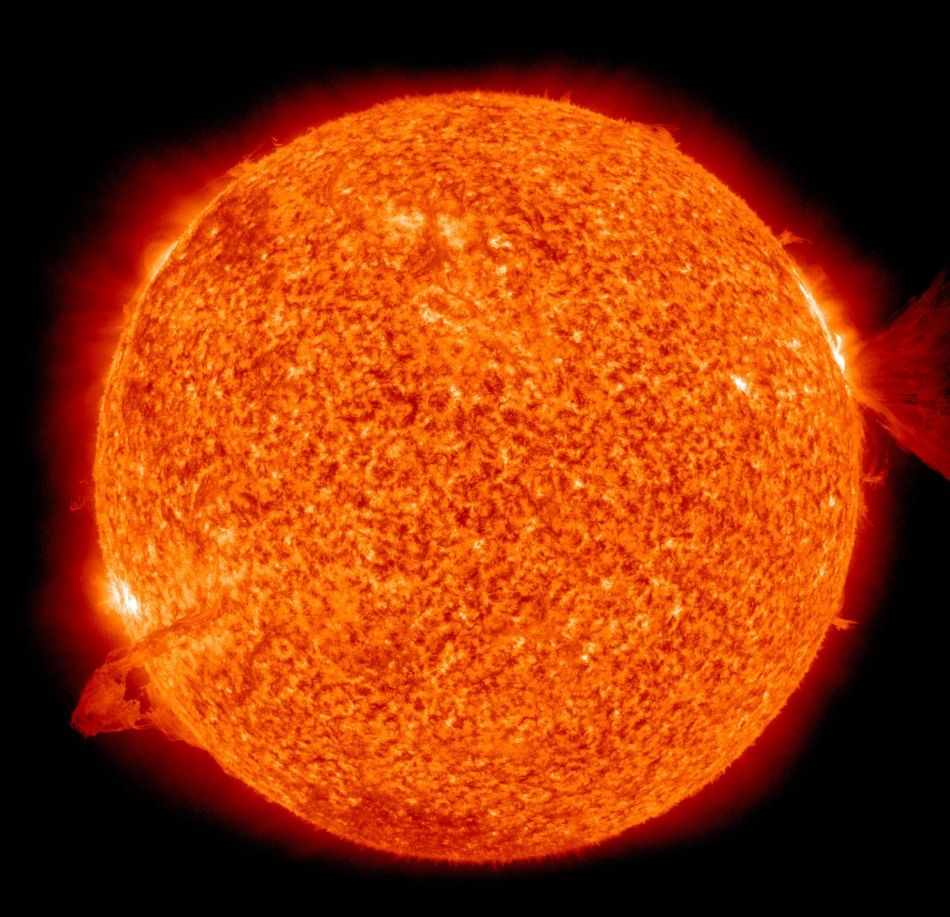 Image of the sun, captured by The Solar Dynamics Observatory spacecraft January 28, 2011, shows nearly simultaneous solar eruptions on opposite sides of the Sun, in this photograph released by NASA January 28. 