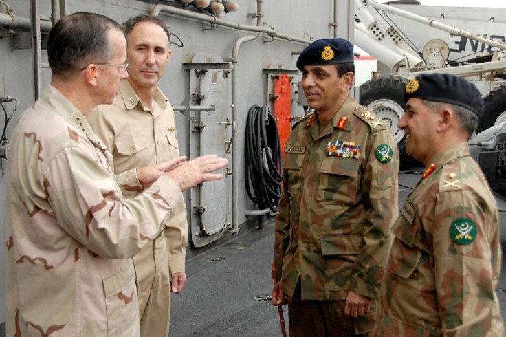 Pasha (right) next to Gen. Ashfaq Kayani o