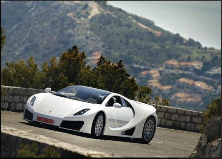 A GTA Spano drives. The GTA Spano was debuted at the Geneva Motor Show 2012.