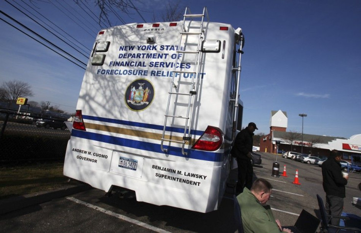 A man leaves the New York State Department of Financial Services Foreclosure Relief Unit in Brentwood, New York February 10, 2012