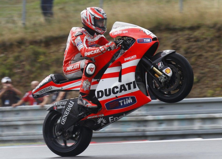 Ducati MotoGP rider Hayden of the U.S. performs a wheelie.