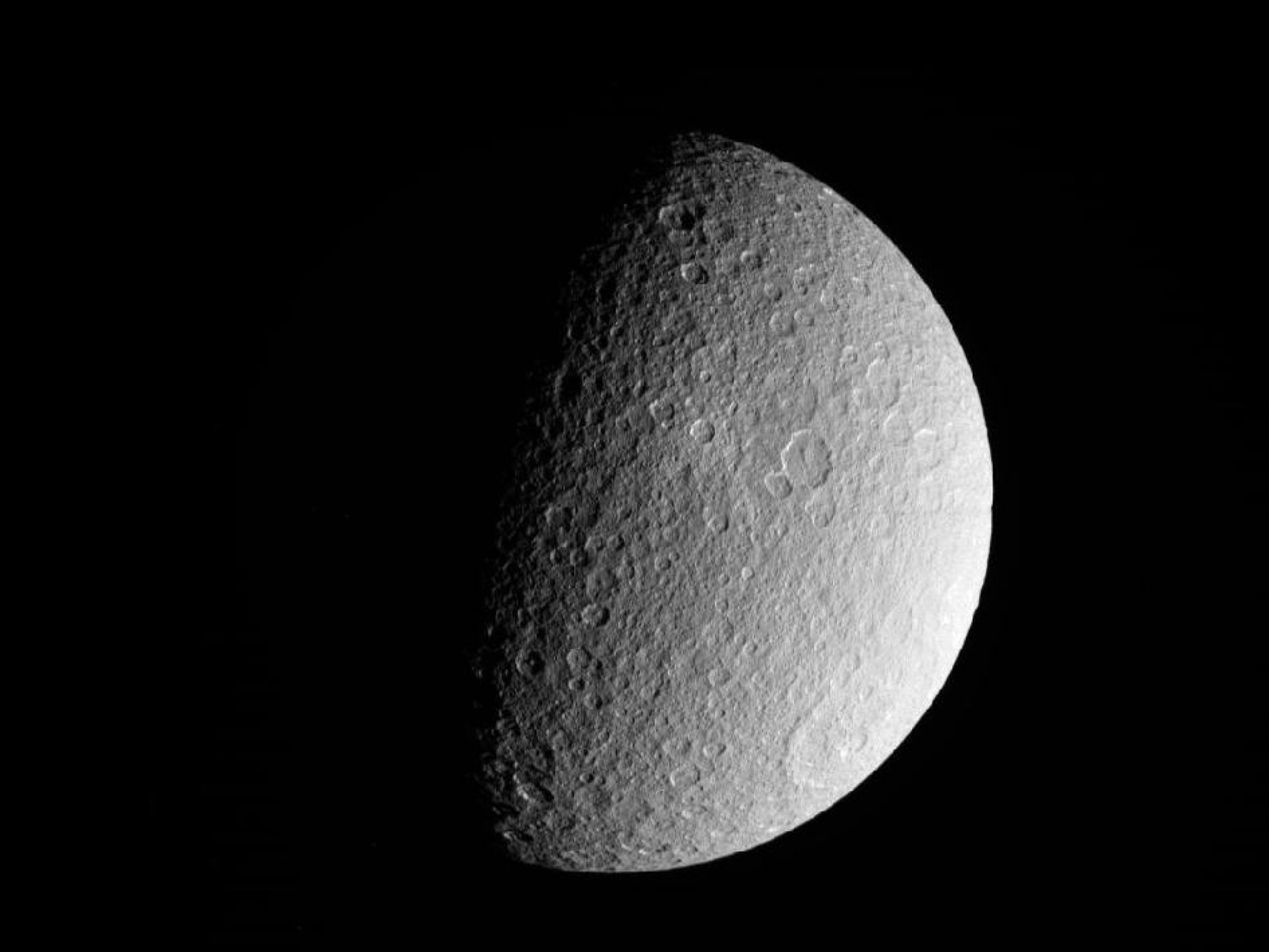 NASA039s Cassini spacecraft took this raw, unprocessed image of Saturn039s moon Rhea