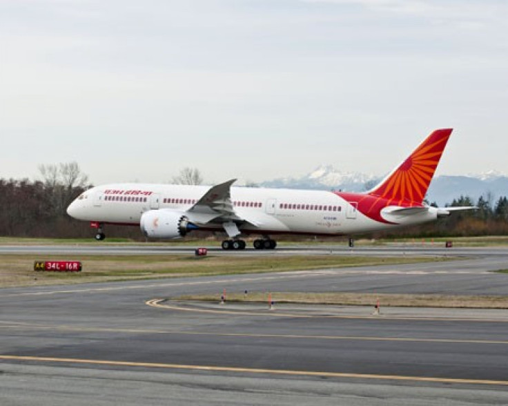 A Boeing 787 in Air India livery on the runway.