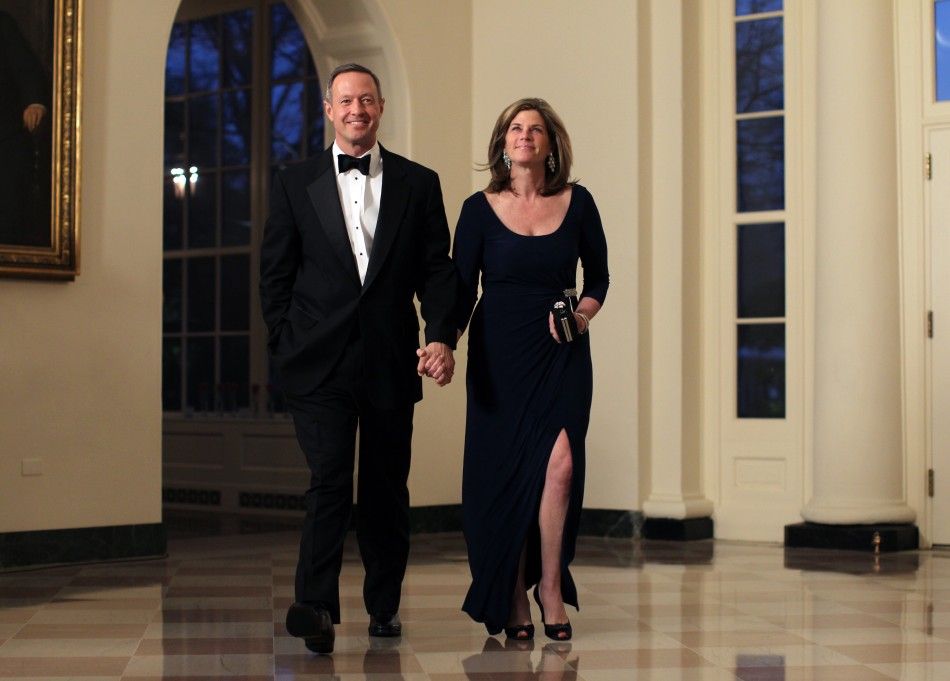 Maryland Governor Martin OMalley and his wife Katie arrive for a State Dinner held in honor of Britains Prime Minister David Cameron and his wife Samantha at the White House in Washington March 14, 2012.