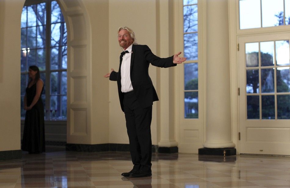 British billionaire Richard Branson arrives for a State Dinner held in honor of Britains Prime Minister David Cameron and his wife Samantha at the White House in Washington March 14, 2012. 