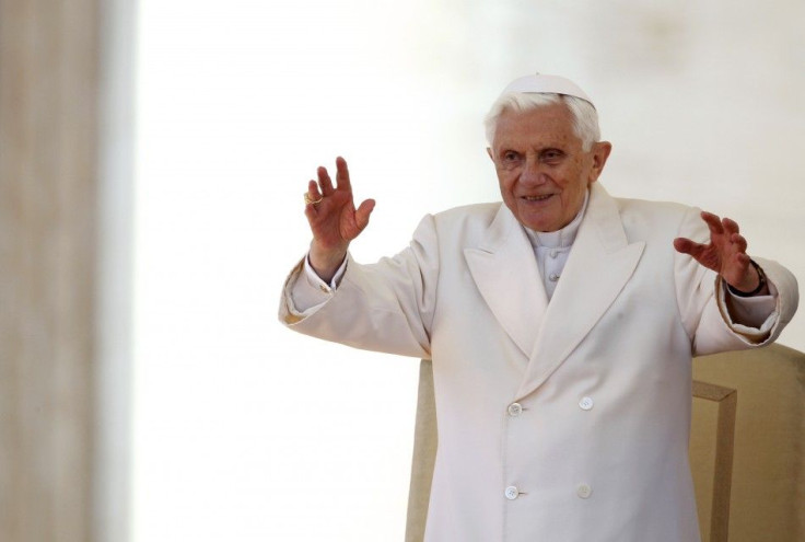 Pope Benedict XVI waves during his Wednesday general audience in Saint Peter&#039;s Square at the Vatican