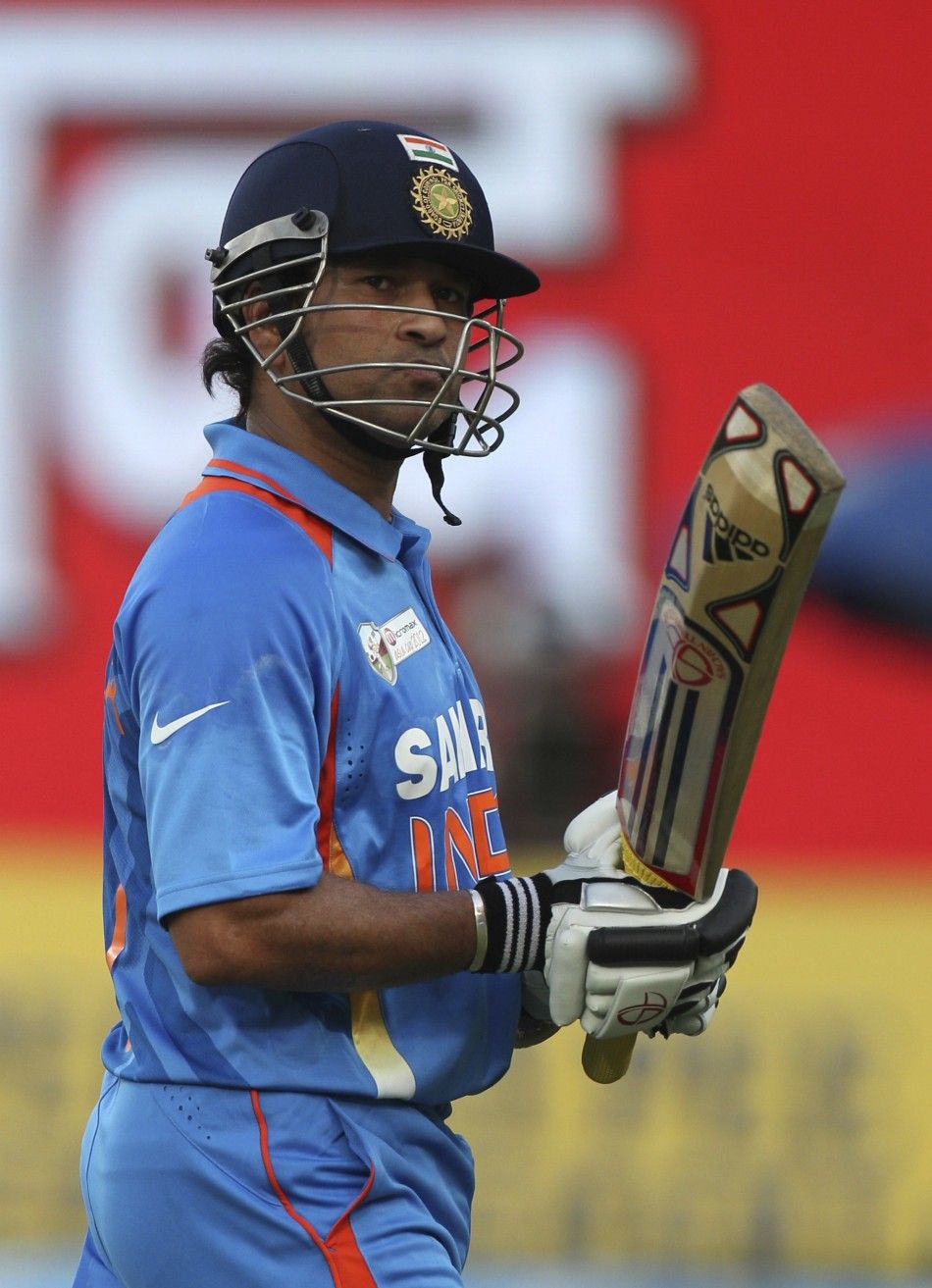 Indias Sachin Tendulkar comes off the field after being dismissed as he scored his 100th international centuries against Bangladesh during their One Day International ODI cricket match of Asia Cup in Dhaka March 16, 2012. 